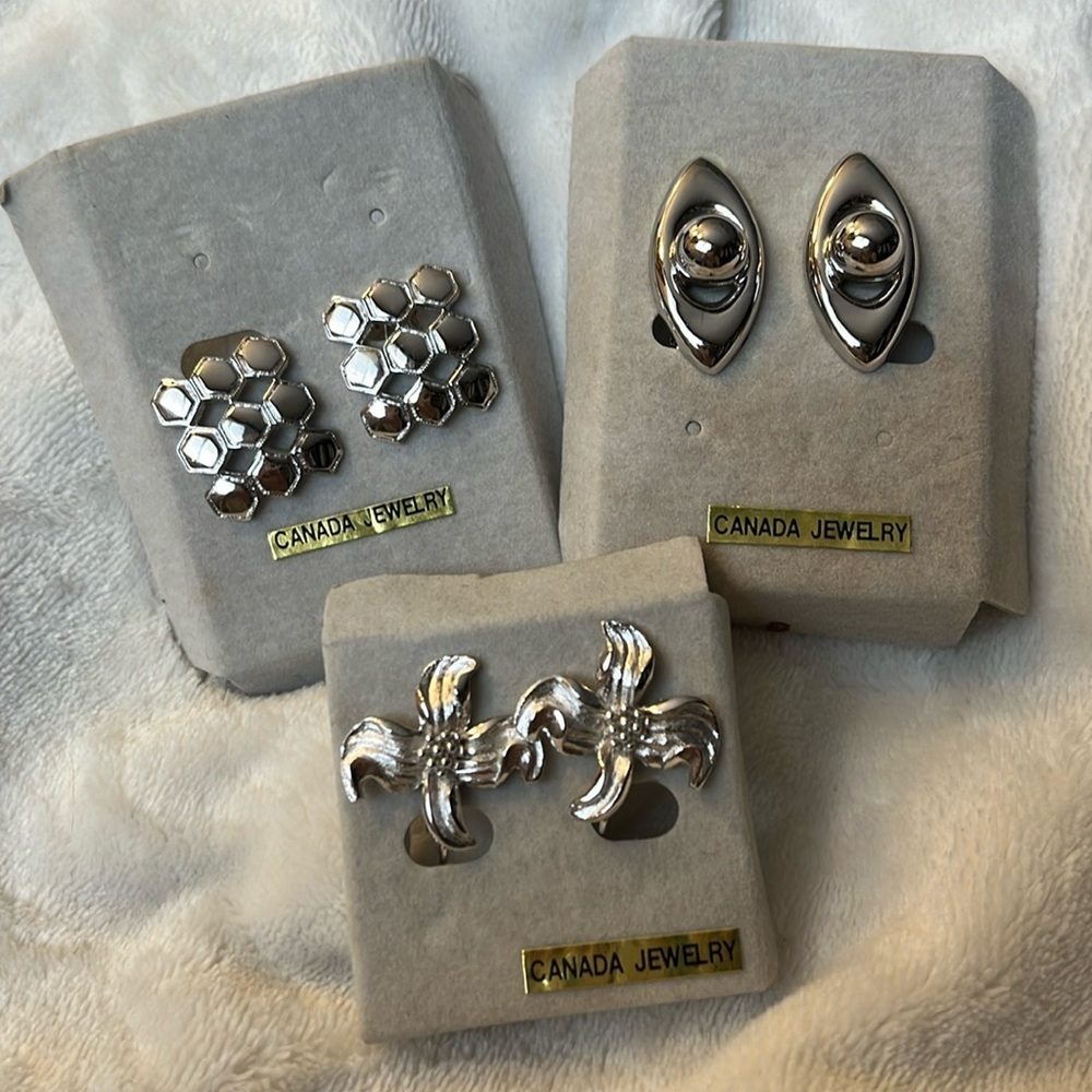 Trio of vintage D’Orlan silvertone clip on earrings